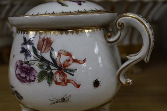 A 19th century Meissen jug and cover, cracked, 12.5cm., a Berlin gilt porcelain basket, another similar basket